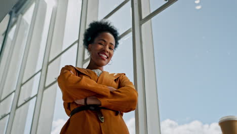 power, arms crossed and face of a black woman