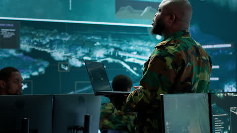 Military-specialists-work-in-a-high-tech-command-post-center