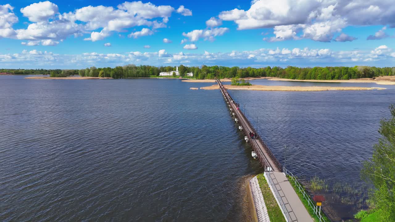 Drone flight over the impressive Biržai wooden bridge and Lake Sirvėna