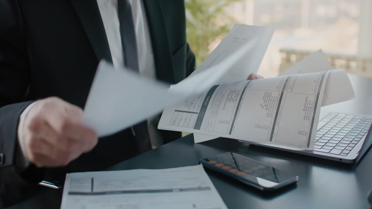 Business Person Reviewing Documents