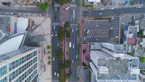 birdseye view of cars moving through busy city streets in santo domingo dominican republic drone aerial