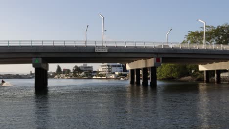 time-lapse of a bridge over a river during daytime