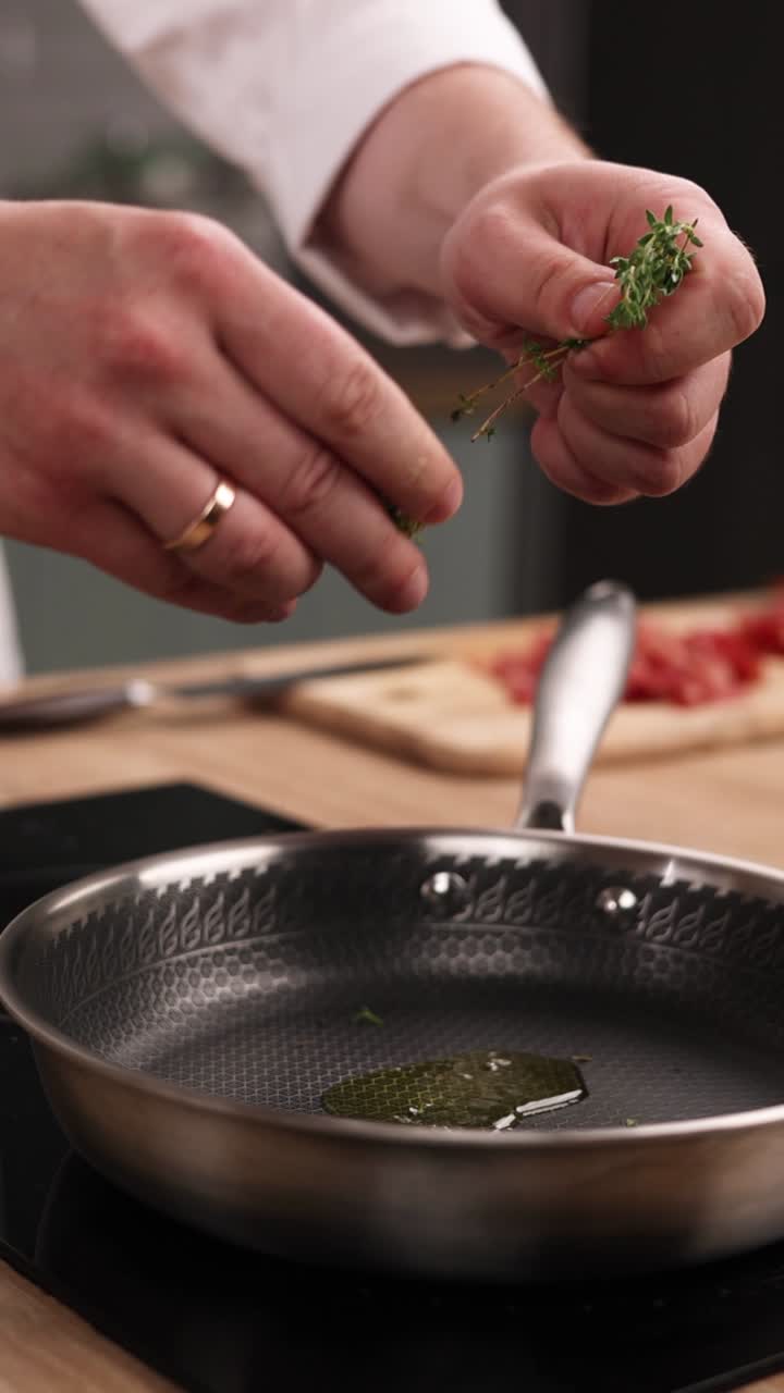 Adding Thyme to a Pan