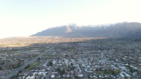 aerial view of houses, streets and buildings in city of ogden in the morning in salt lake city, utah