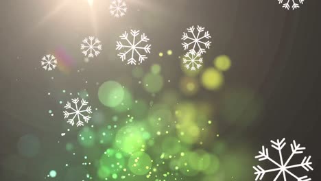 animación de copos de nieve sobre manchas verdes brillantes sobre un fondo negro