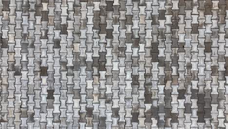 top view of interlocking paving stone texture. outdoor concrete slab pavement high quality drone image