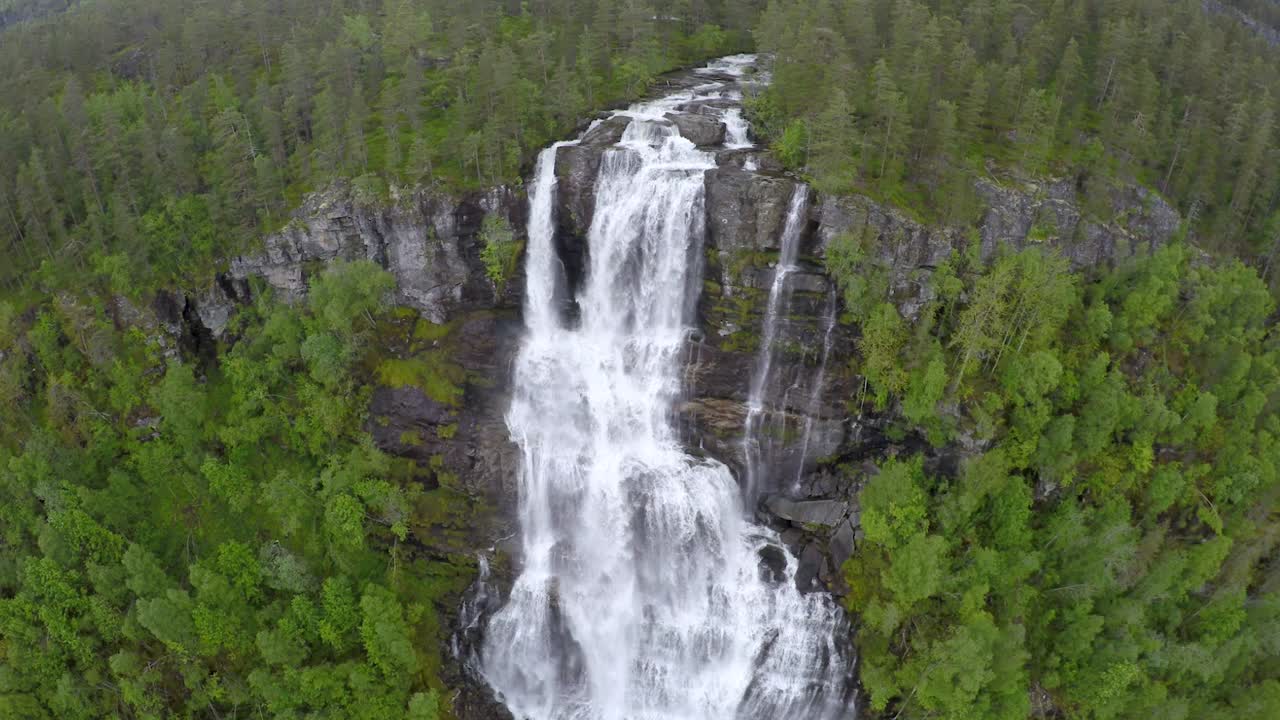 Aerial footage from Tvindefossen waterfall from the bird's-eye view, Norway