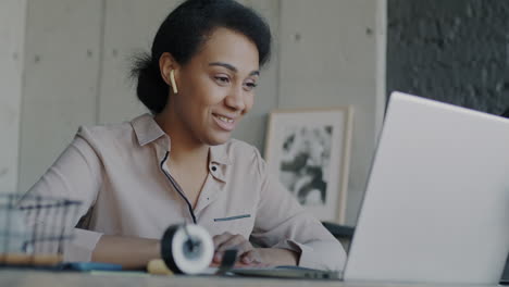 woman in a video call on laptop