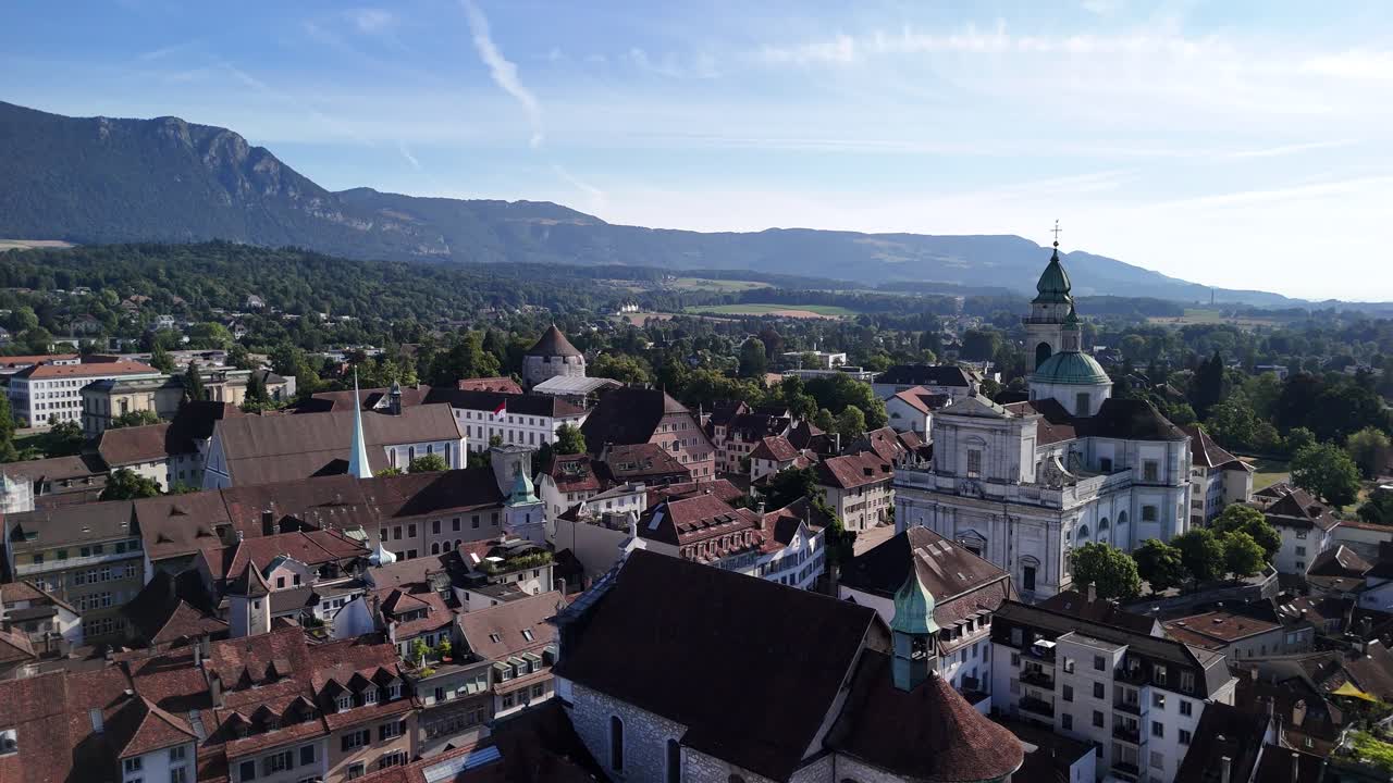 Aerial View of a European City with Mountains