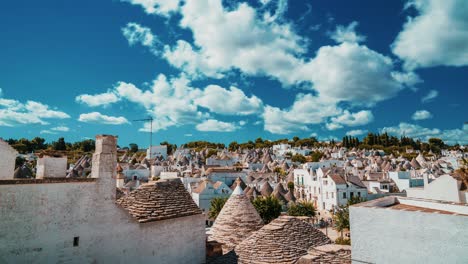 timelapse view of the traditional trulli houses in arbelobello, province bari, region puglia, italy.