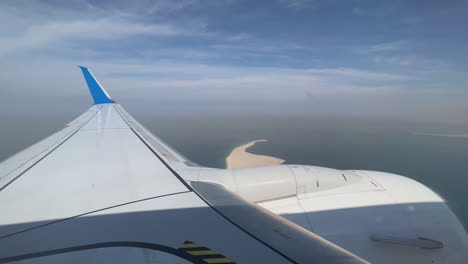 airplane view over land and sea