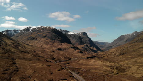 drone shot of the three sisters mountains in glencoe, scotland