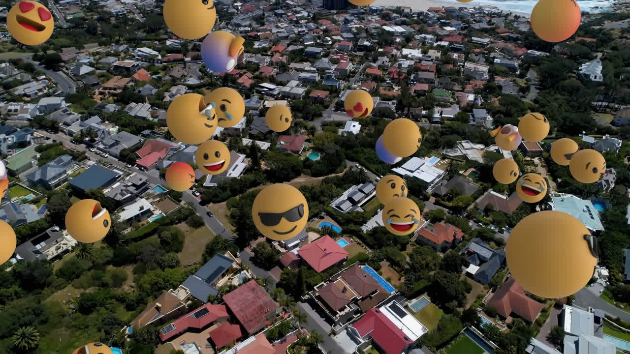 composición digital de varios emojis de rostros flotando contra la vista aérea del paisaje urbano