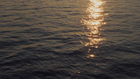 The-sun-is-setting-and-is-reflected-in-the-water