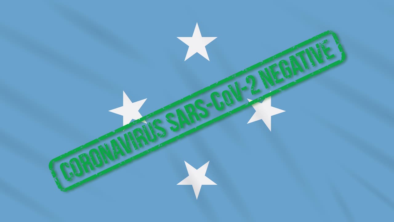 미크로네시아는 코로나 바이러스로부터 자유로워진 녹색 스프를 가진 발을 흔들고 있습니다.