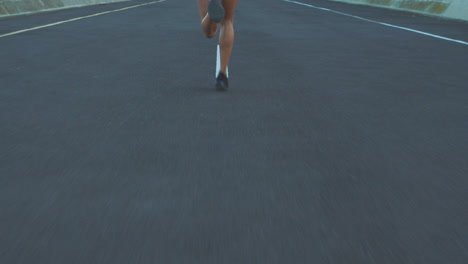 person running on a road