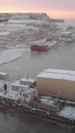 frozen river port at sunrise