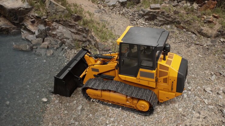Excavator working near the waters edge in a rugged outdoor setting