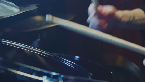 close-up of a drummer playing drums