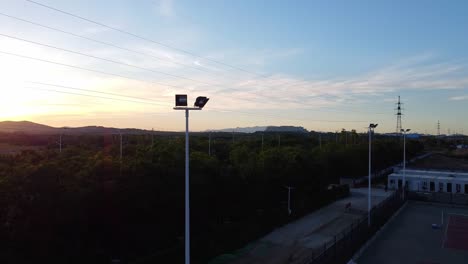 Sunset-behind-the-mountains---Nanhai-New-District,-China