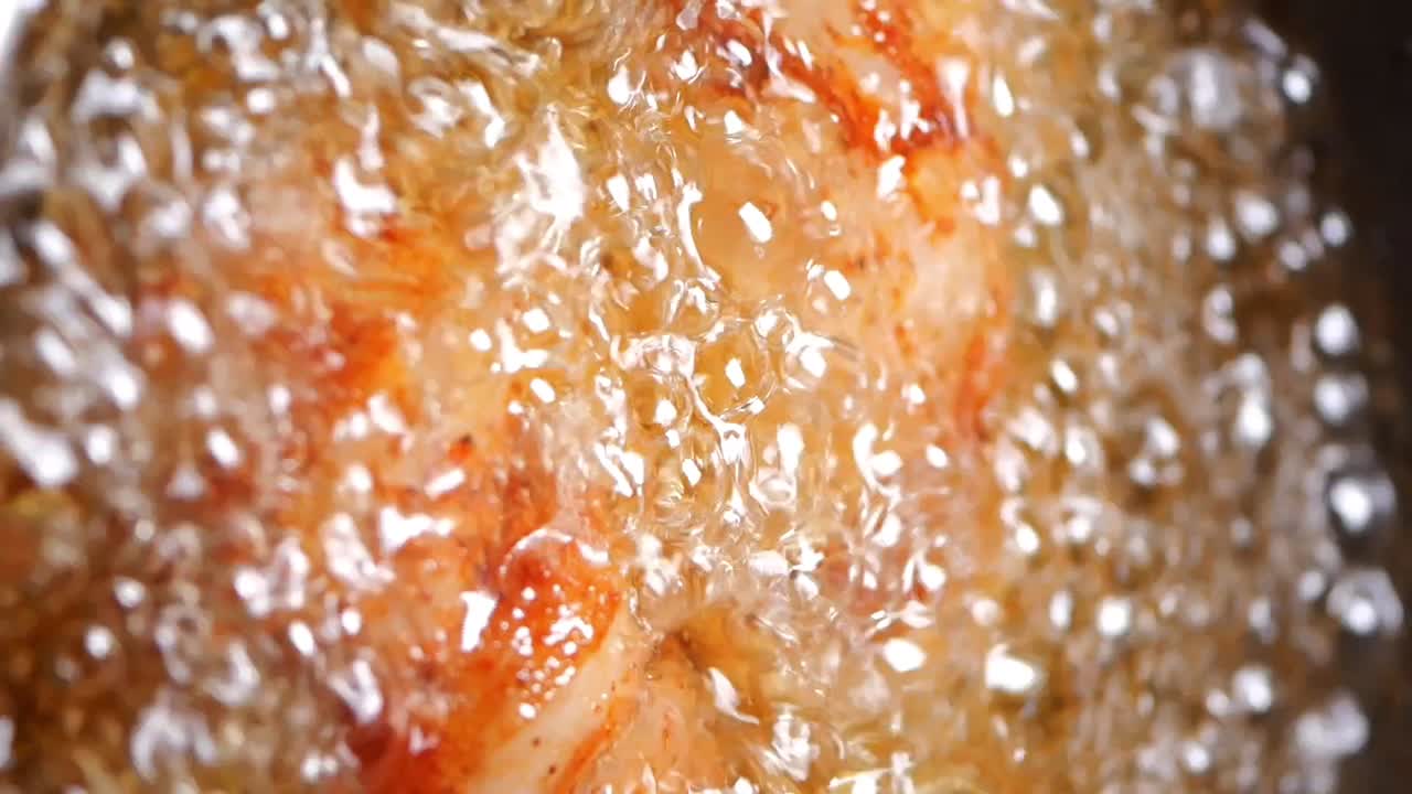 Food Deep Frying in Bubbling Hot Oil