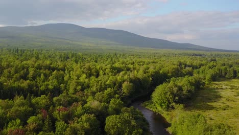 Aerial-pull-of-the-Dead-River-near-Rangely,-Maine
