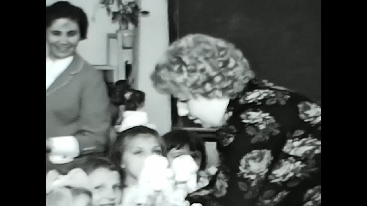 Group of Children in a Black and White Video. CIRCA USSR 1970: A captivating black and white video of a group of children captured during the Soviet Union era.