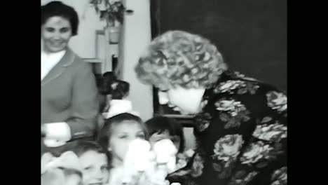 group of children in a black and white video. circa ussr 1970: a captivating black and white video of a group of children captured during the soviet union era.