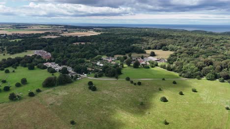 Pull-back-drone-aerial-reverse-reveal-National-Trust-Felbrigg-Hall,-Norfolk-UK