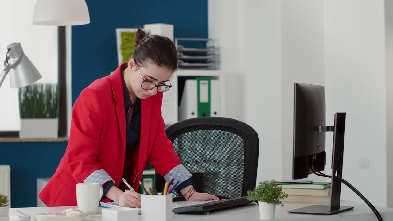 Biologist researcher scientist looking at leaf sample under medical microscope