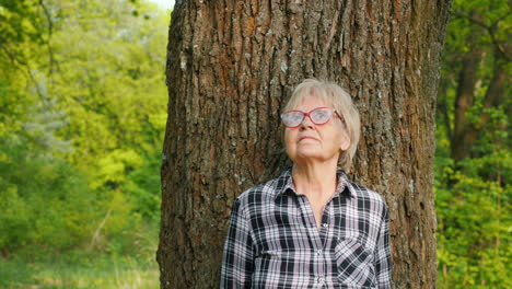 senior woman in a forest