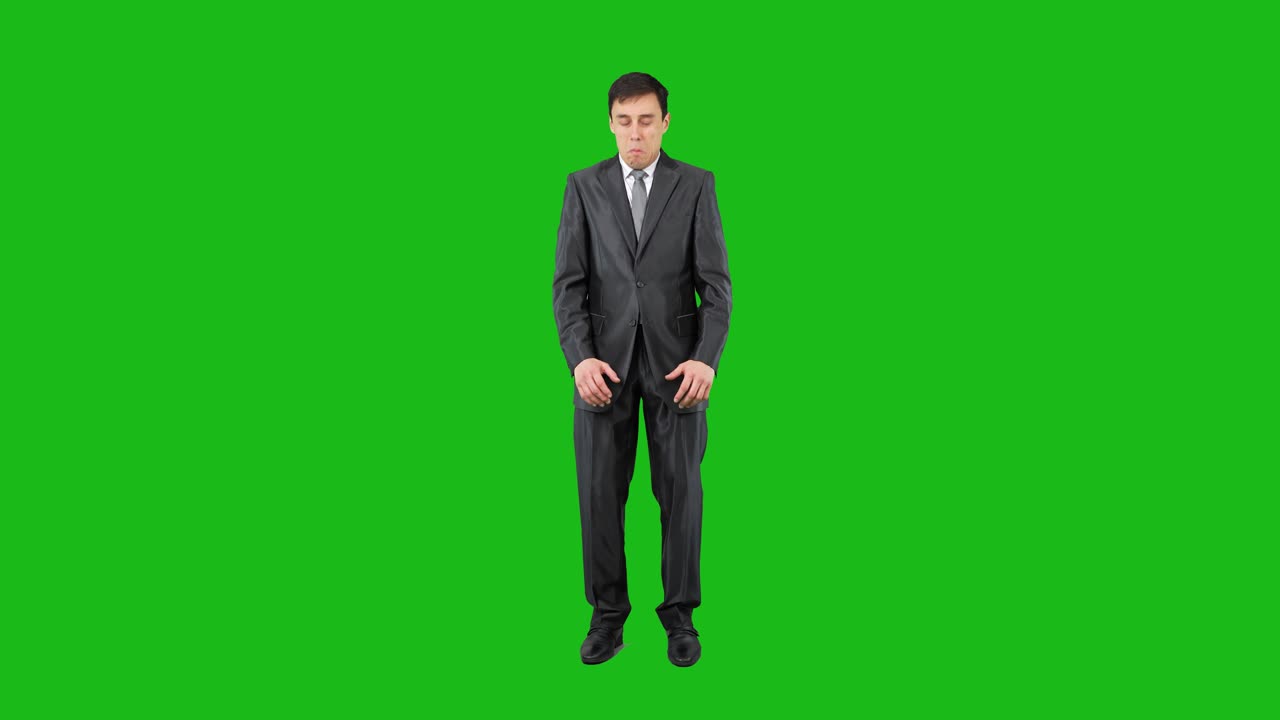 Man in Suit Showing Different Emotions on Green Screen
