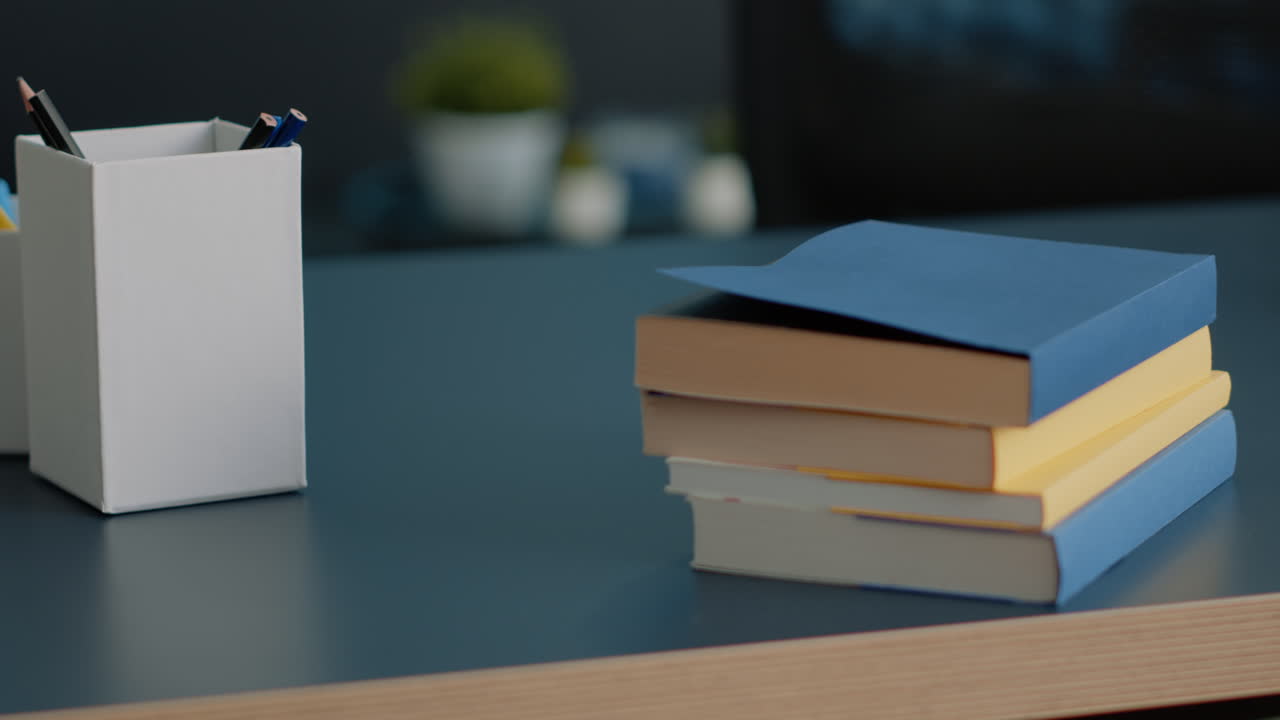 Close up of desk with school books for education and studying
