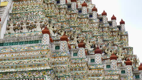 thai traditional literature ancient giant statue around the base and pagoda of wat arun