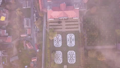 Misty-aerial-view-of-Castle-Schloss-Hundisburg-Germany