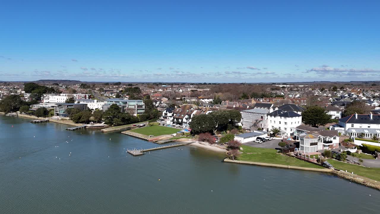Slow Panning drone aerial Large Waterfront houses Mudeford Christchurch UK