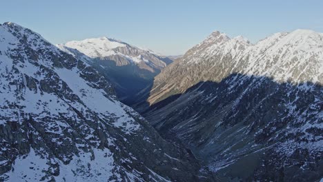 Drone-footage-of-a-snowy-valley