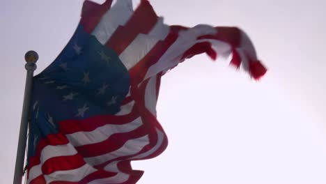 an american flag waves in slow motion