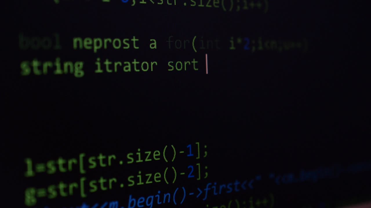 Source code on the monitor screen. Source code