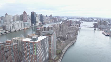 cinematic 4k aerial orbit of queensboro bridge nyc east river and hudson