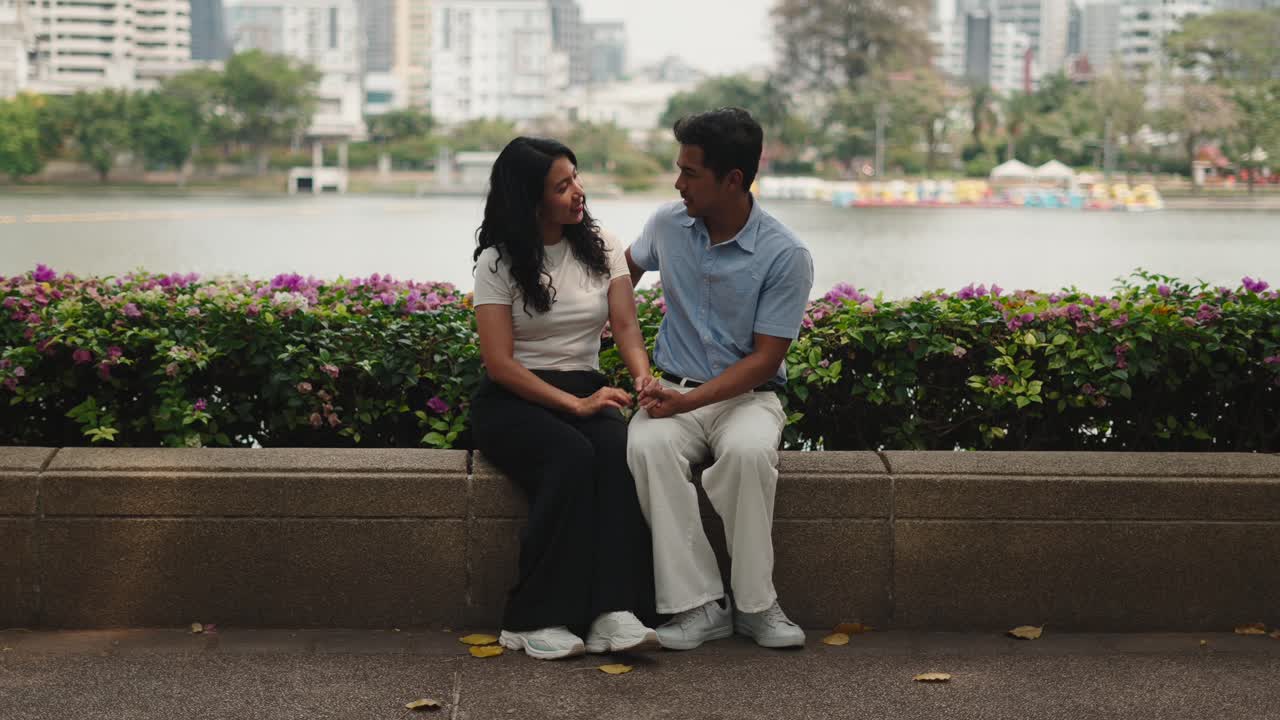 Couple Enjoying a Romantic Moment in a Park Setting