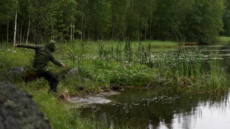 Wildlife-photographer-slips-and-drops-expensive-camera-in-water,Tracking-pan-shot