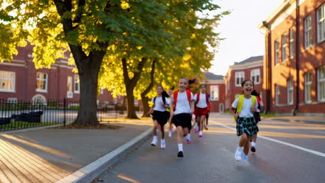 happy school girls running from school
