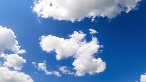 azure sky with floating white soft clouds. beautiful bright summer sky with cloudscape. timelapse.