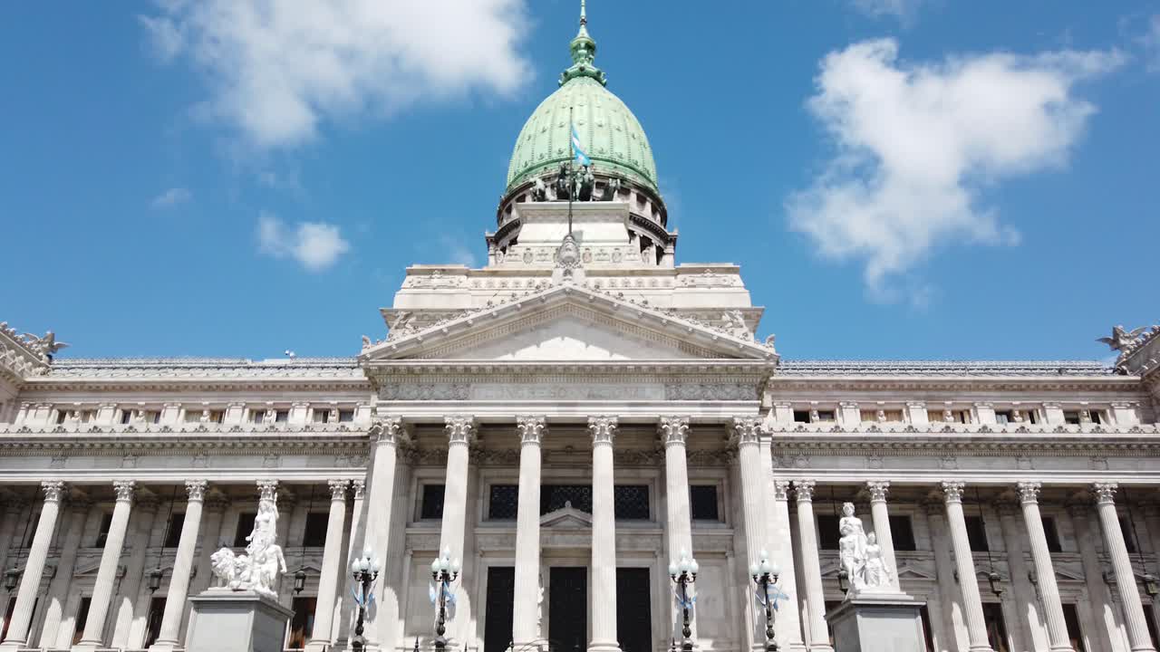 Low angle view of National Argentine Congress iconic building over sunny skyline