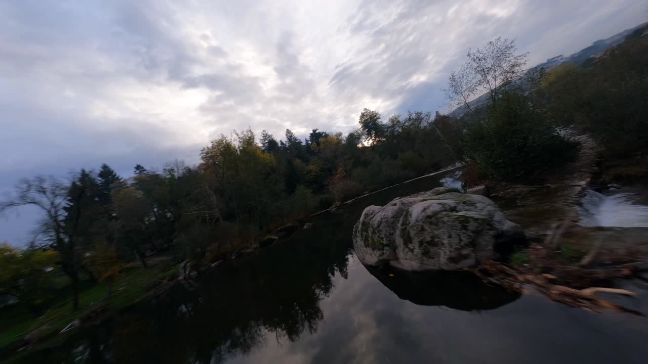 Spectacular high-speed aerial shot over Amarante Tamega river, Portugal