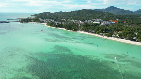 kitesurfing and boarding in stunning lagoon on south side of koh phan gan in chumpon archipelago