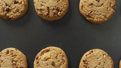 Video-of-biscuits-with-chocolate-on-baking-tray-over-white-background