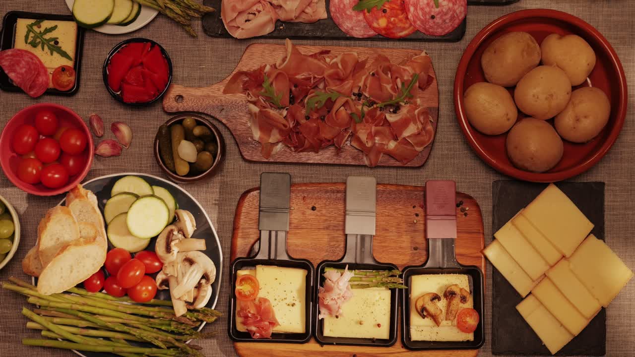 Italian or Spanish restaurant with traditional tapas food, Spanish cuisine, delicious tapas and cheese plate, bruschetta with cheese, olives dry tomatoes and tasty sandwich bar appetizer, buffet