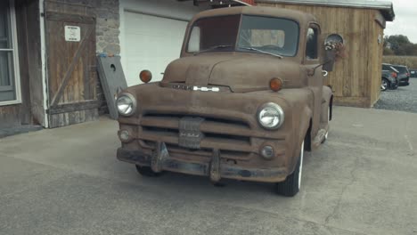 a dynamic shot moving towards the left of an old north american harvester vehicle